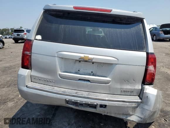 2015 Chevrolet Suburban LTZ с VIN 1GNSKKKC2FR156607, выставлен на аукционе Copart как лот 62497734 с пробегом 139 504 миль миль и Списание • Salvage title. История ставок и продаж доступна на DreamBid. Изображение 6.