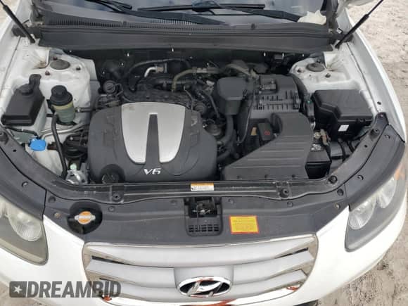 2012 Hyundai Santa Fe Limited z VIN 5XYZK4AG9CG103839, wystawiony jako Copart lot #90547425 z przebiegiem 65 297 mil mil oraz Szkoda całkowita • Salvage title. Historia ofert i sprzedaży dostępna na DreamBid. Obrazek 12.