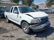 ✅ 1999 Ford F-150 • VIN: 1FTRX17W7XKA64389 • Lot: 42923315. Wystawiony na IAAI z przebiegiem 345 208 mil. Bezpłatny archiwum sprzedaży aukcyjnych z USA i szczegółowy raport historii pojazdu na DreamBid. Zdjęcie 1.