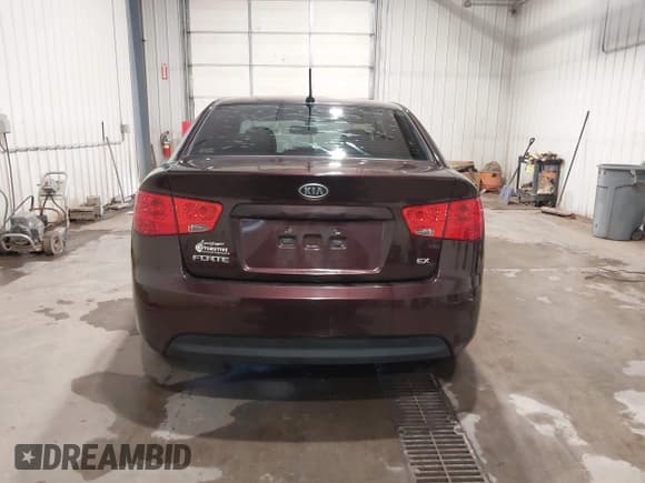 ✅ 2010 Kia Forte EX • VIN: KNAFU4A26A5855308 • Lot: 43315563. Listed on IAAI with 90,821 mi. Free auction sales archive from the USA and detailed vehicle history report at DreamBid. Image 16.
