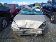 ✅ 2000 Ford Focus SE • VIN: 1FAFP3435YW292500 • Lot: 41173367. Wystawiony na IAAI z przebiegiem 253 898 mil. Bezpłatny archiwum sprzedaży aukcyjnych z USA i szczegółowy raport historii pojazdu na DreamBid. Zdjęcie 6.