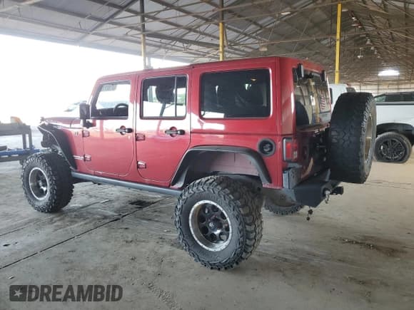✅ 2012 Jeep Wrangler Unlimited Rubicon • VIN: 1C4HJWFGXCL165273 • Lot: 68197715. Listed on Copart with 155,906 mi. Free auction sales archive from the USA and detailed vehicle history report at DreamBid. Image 2.