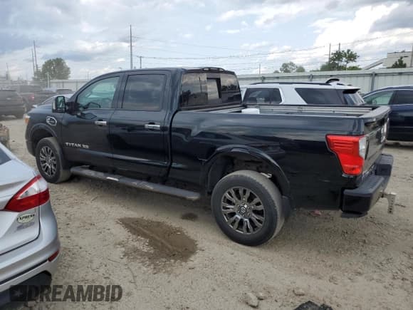 ✅ 2016 Nissan Titan Platinum Reserve • VIN: 1N6BA1F4XGN504958 • Лот: 63560315. Опубликован ранее на Copart с пробегом 181 696 миль. Бесплатный доступ к архиву аукционных продаж из США и подробный отчёт об истории автомобиля на DreamBid. Изображение 2.
