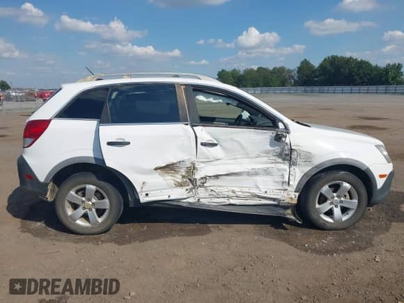 2012 Chevrolet Captiva Sport LS z VIN 3GNAL2EK8CS558829, wystawiony jako IAAI lot #43361718 z przebiegiem 116 137 mil mil oraz . Historia ofert i sprzedaży dostępna na DreamBid. Obrazek 13.