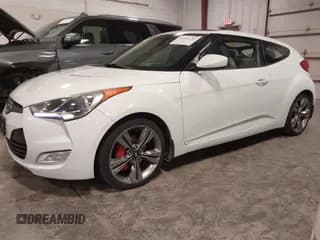 ✅ 2013 Hyundai Veloster w/Black Int • VIN: KMHTC6AD1DU109361 • Lot: 41101157. Wystawiony na IAAI z przebiegiem 119 386 mil. Bezpłatny archiwum sprzedaży aukcyjnych z USA i szczegółowy raport historii pojazdu na DreamBid. Zdjęcie 2.