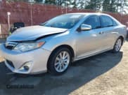 ✅ 2012 Toyota Camry XLE • VIN: 4T4BF1FK0CR270088 • Лот: 43513344. Опубликован ранее на IAAI с пробегом 185 308 миль. Бесплатный доступ к архиву аукционных продаж из США и подробный отчёт об истории автомобиля на DreamBid. Изображение 2.