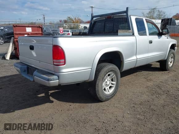 2003 Dodge Dakota Sport with VIN 1D7HG32N43S138938, listed as a IAAI auction lot 43610418 with 112,101 mi miles and . Bid and sale history available at DreamBid. Image 4.