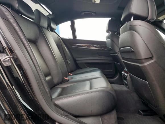 ✅ 2014 BMW 7 Series 740i • VIN: WBAYA6C5XED144517 • Лот: 90255015. Опубликован ранее на Copart с пробегом 178 636 миль. Бесплатный доступ к архиву аукционных продаж из США и подробный отчёт об истории автомобиля на DreamBid. Изображение 10.