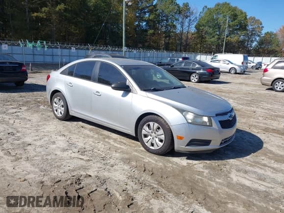 ✅ 2013 Chevrolet Cruze LS • VIN: 1G1PA5SH0D7259573 • Lot: 43613680. Listed on IAAI with 146,199 mi. Free auction sales archive from the USA and detailed vehicle history report at DreamBid. Image 1.