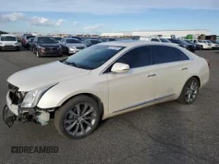 ✅ 2013 Cadillac XTS Luxury • VIN: 2G61R5S31D9215402 • Lot: 91679205. Listed on Copart with 179,448 mi. Free auction sales archive from the USA and detailed vehicle history report at DreamBid. Image 1.
