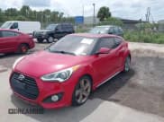✅ 2013 Hyundai Veloster Turbo • VIN: KMHTC6AE2DU129756 • Lot: 43147167. Listed on IAAI with 88,763 mi. Free auction sales archive from the USA and detailed vehicle history report at DreamBid. Image 2.