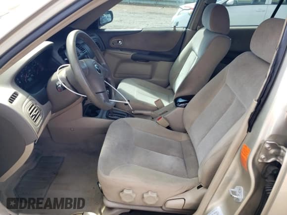 ✅ 2003 Mazda Protege DX • VIN: JM1BJ226730103729 • Lot: 63227285. Listed on Copart with 185,866 mi. Free auction sales archive from the USA and detailed vehicle history report at DreamBid. Image 7.