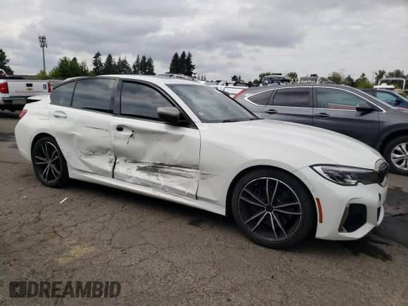 2020 BMW 3 Series M340i z VIN WBA5U7C07LFH55758, wystawiony jako Copart lot #71877665 z przebiegiem Nie podano mil oraz Szkoda całkowita • Salvage title. Historia ofert i sprzedaży dostępna na DreamBid. Obrazek 4.