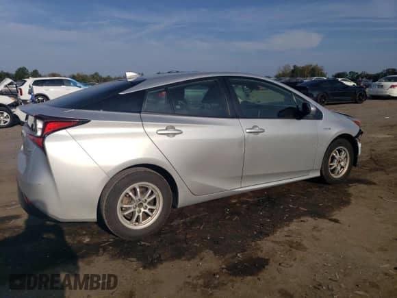 2022 Toyota Prius L Eco с VIN JTDKAMFU4N3168107, выставлен на аукционе Copart как лот 82113755 с пробегом 73 232 миль миль и Списание • Salvage title. История ставок и продаж доступна на DreamBid. Изображение 3.