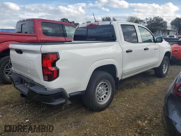 ✅ 2023 Chevrolet Colorado 2WD Work Truck • VIN: 1GCGSBEC2P1184742 • Лот: 81118005. Опубликован ранее на Copart с пробегом 26 641 миль. Бесплатный доступ к архиву аукционных продаж из США и подробный отчёт об истории автомобиля на DreamBid. Изображение 3.