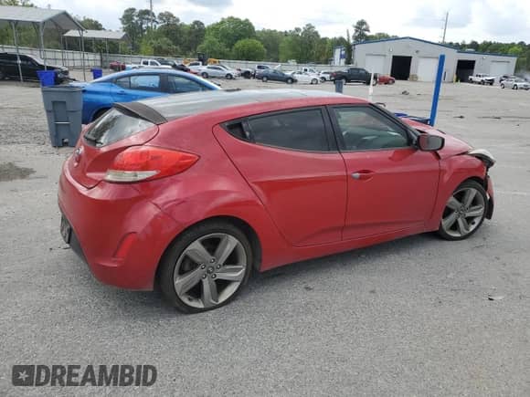 2013 Hyundai Veloster w/Gray Int z VIN KMHTC6AD8DU104366, wystawiony jako Copart lot #52378865 z przebiegiem Nie podano mil oraz Szkoda całkowita • Salvage title. Historia ofert i sprzedaży dostępna na DreamBid. Obrazek 3.