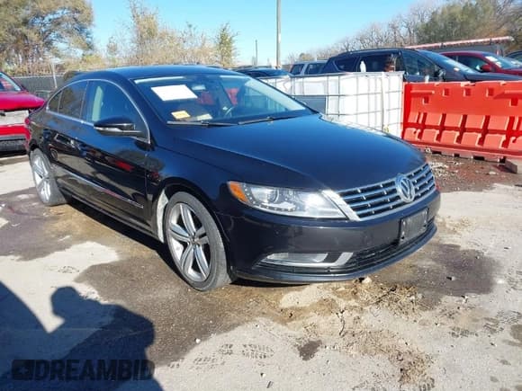 ✅ 2013 Volkswagen CC R-Line • VIN: WVWBP7AN1DE500863 • Lot: 40929279. Listed on IAAI with 150,379 mi. Free auction sales archive from the USA and detailed vehicle history report at DreamBid. Image 1.