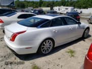 ✅ 2016 Jaguar XJ R-Sport • VIN: SAJWJ1CD2G8V92185 • Lot: 62926493. Listed on Copart with 55,840 mi. Free auction sales archive from the USA and detailed vehicle history report at DreamBid. Image 3.