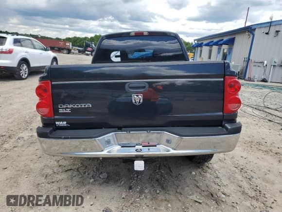 2006 Dodge Dakota SLT with VIN 1D7HE48K66S687229, listed as a Copart auction lot 56238735 with 148,785 mi miles and Salvage title. Bid and sale history available at DreamBid. Image 6.