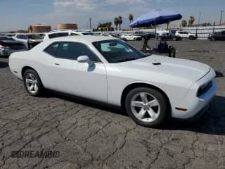 ✅ 2014 Dodge Challenger SXT • VIN: 2C3CDYAG6EH313038 • Lot: 74152354. Wystawiony na Copart z przebiegiem 209 811 mil. Bezpłatny archiwum sprzedaży aukcyjnych z USA i szczegółowy raport historii pojazdu na DreamBid. Zdjęcie 4.