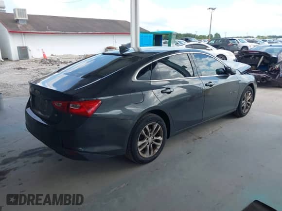 2018 Chevrolet Malibu LT z VIN 1G1ZD5ST3JF175821, wystawiony jako IAAI lot #43226436 z przebiegiem 167 996 mil mil oraz . Historia ofert i sprzedaży dostępna na DreamBid. Obrazek 4.