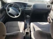 ✅ 1994 Toyota Corolla Deluxe • VIN: 1NXAE09B0RZ126645 • Lot: 67000545. Listed on Copart with 198,129 mi. Free auction sales archive from the USA and detailed vehicle history report at DreamBid. Image 8.