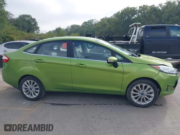 ✅ 2018 Ford Fiesta Titanium • VIN: 3FADP4CJ9JM117668 • Lot: 43281962. Listed on IAAI with 104,716 mi. Free auction sales archive from the USA and detailed vehicle history report at DreamBid. Image 13.