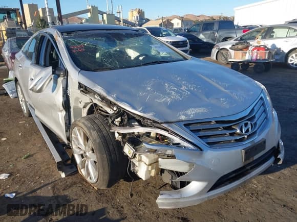 ✅ 2013 Hyundai Azera • VIN: KMHFH4JGXDA203110 • Лот: 41813088. Опубликован ранее на IAAI с пробегом 104 854 миль. Бесплатный доступ к архиву аукционных продаж из США и подробный отчёт об истории автомобиля на DreamBid. Изображение 6.