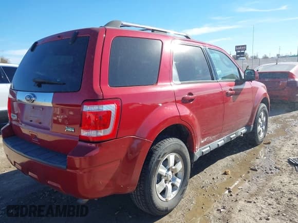 ✅ 2010 Ford Escape Limited • VIN: 1FMCU0EG8AKD01074 • Lot: 43732560. Listed on IAAI with 83,954 mi. Free auction sales archive from the USA and detailed vehicle history report at DreamBid. Image 4.