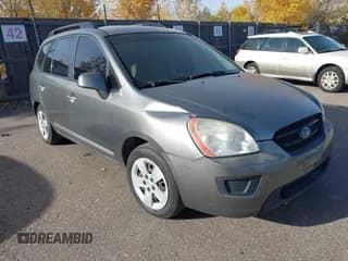 ✅ 2009 Kia Rondo LX • VIN: KNAFG528397255409 • Lot: 43550345. Listed on IAAI with 199,636 mi. Free auction sales archive from the USA and detailed vehicle history report at DreamBid. Image 1.