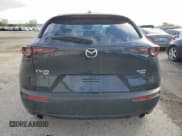 ✅ 2023 Mazda CX-30 Premium • VIN: 3MVDMBDY1PM585694 • Lot: 74969314. Listed on Copart with 9,740 mi. Free auction sales archive from the USA and detailed vehicle history report at DreamBid. Image 6.