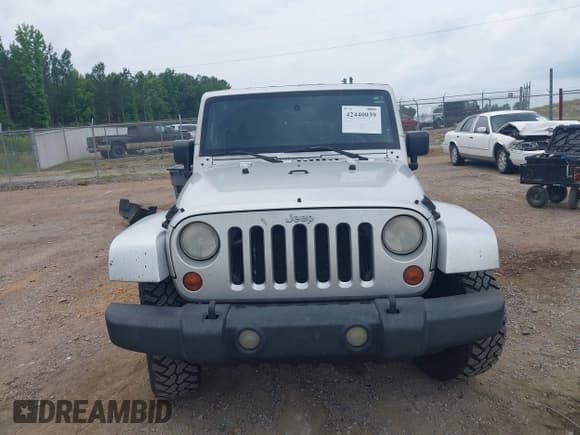 ✅ 2008 Jeep Wrangler Unlimited Rubicon • VIN: 1J8GA691X8L593427 • Лот: 42440039. Опубликован ранее на IAAI с пробегом 289 809 миль. Бесплатный доступ к архиву аукционных продаж из США и подробный отчёт об истории автомобиля на DreamBid. Изображение 13.