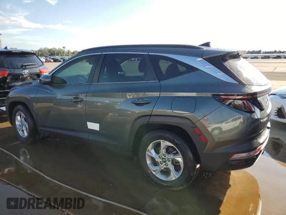 ✅ 2022 Hyundai Tucson SEL • VIN: 5NMJB3AE1NH002261 • Lot: 73687084. Wystawiony na Copart z przebiegiem 36 300 mil. Bezpłatny archiwum sprzedaży aukcyjnych z USA i szczegółowy raport historii pojazdu na DreamBid. Zdjęcie 2.