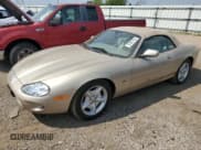 ✅ 1998 Jaguar XK • VIN: SAJGX2241WC025200 • Lot: 67867325. Listed on Copart with 55,803 mi. Free auction sales archive from the USA and detailed vehicle history report at DreamBid. Image 1.