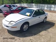 ✅ 1997 Pontiac Sunfire SE • VIN: 1G2JB5247V7501255 • Лот: 42177041. Опубликован ранее на IAAI с пробегом 209 124 миль. Бесплатный доступ к архиву аукционных продаж из США и подробный отчёт об истории автомобиля на DreamBid. Изображение 2.