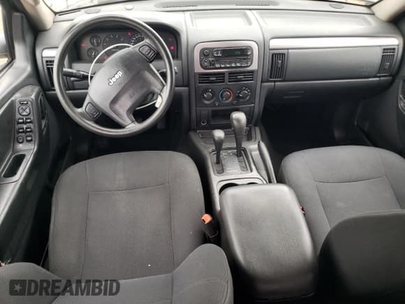 ✅ 2003 Jeep Grand Cherokee Laredo • VIN: 1J4GW48S83C600188 • Lot: 86791215. Listed on Copart with 171,990 mi. Free auction sales archive from the USA and detailed vehicle history report at DreamBid. Image 8.
