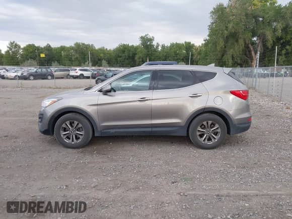 2015 Hyundai Santa Fe with VIN 5XYZTDLB3FG250726, listed as a IAAI auction lot 43108562 with 178,355 mi miles and . Bid and sale history available at DreamBid. Image 14.