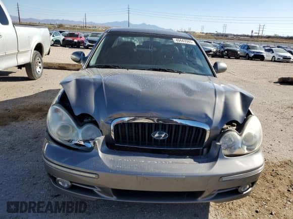 2004 Hyundai Sonata GLS z VIN KMHWF35H94A085053, wystawiony jako Copart lot #49443565 z przebiegiem 79 190 mil mil oraz Szkoda całkowita • Salvage title. Historia ofert i sprzedaży dostępna na DreamBid. Obrazek 5.