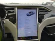 ✅ 2014 Tesla Model S 60 • VIN: 5YJSA1S13EFP63883 • Lot: 42295100. Listed on IAAI with 143,734 mi. Free auction sales archive from the USA and detailed vehicle history report at DreamBid. Image 7.