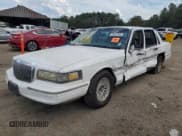 ✅ 1997 Lincoln Town Car Executive • VIN: 1LNLM81W8VY668653 • Lot: 81947165. Wystawiony na Copart z przebiegiem 246 501 mil. Bezpłatny archiwum sprzedaży aukcyjnych z USA i szczegółowy raport historii pojazdu na DreamBid. Zdjęcie 1.