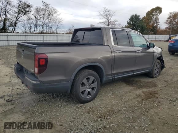 ✅ 2020 Honda Ridgeline RTL-E • VIN: 5FPYK3F71LB007491 • Lot: 90532725. Listed on Copart with 106,765 mi. Free auction sales archive from the USA and detailed vehicle history report at DreamBid. Image 3.