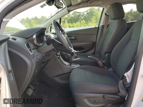 ✅ 2020 Chevrolet Trax LS • VIN: KL7CJNSB5LB320927 • Lot: 80780325. Listed on Copart with 59,329 mi. Free auction sales archive from the USA and detailed vehicle history report at DreamBid. Image 7.