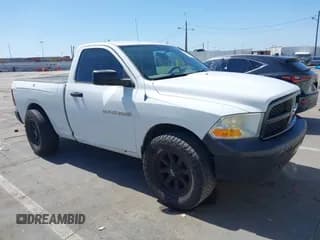 ✅ 2012 Ram 1500 ST • VIN: 3C6JD6APXCG237206 • Lot: 42528623. Listed on IAAI with 122,765 mi. Free auction sales archive from the USA and detailed vehicle history report at DreamBid. Image 1.