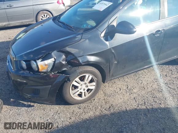 ✅ 2014 Chevrolet Sonic LT • VIN: 1G1JC5SH0E4228312 • Lot: 43579562. Listed on IAAI with 136,210 mi. Free auction sales archive from the USA and detailed vehicle history report at DreamBid. Image 6.