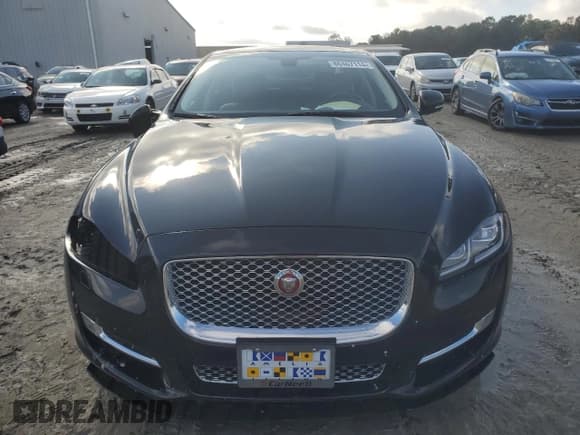 ✅ 2016 Jaguar XJ Portfolio • VIN: SAJWJ2GDXG8W03143 • Lot: 86467114. Listed on Copart with 42,923 mi. Free auction sales archive from the USA and detailed vehicle history report at DreamBid. Image 5.