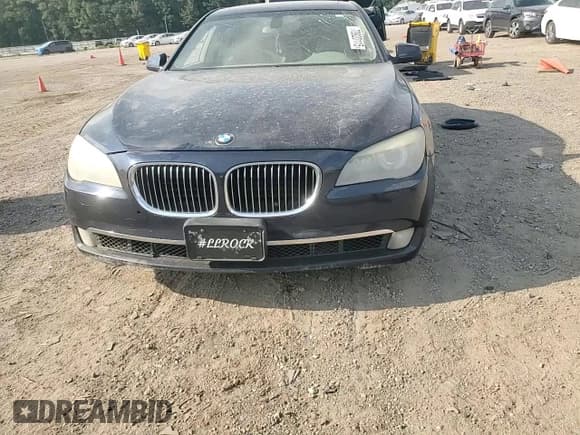 ✅ 2011 BMW 7 Series 750Li • VIN: WBAKB8C51BCY64837 • Лот: 70920115. Опубликован ранее на Copart с пробегом Не указан. Бесплатный доступ к архиву аукционных продаж из США и подробный отчёт об истории автомобиля на DreamBid. Изображение 13.
