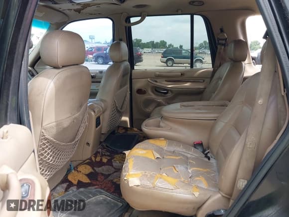 ✅ 1999 Lincoln Navigator • VIN: 5LMRU27L8XLJ03949 • Лот: 42398090. Опубликован ранее на IAAI с пробегом Не указан. Бесплатный доступ к архиву аукционных продаж из США и подробный отчёт об истории автомобиля на DreamBid. Изображение 8.