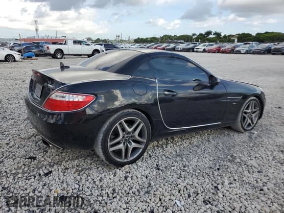 ✅ 2015 Mercedes-Benz SLK 250 • VIN: WDDPK4HA9FF112773 • Lot: 63842954. Listed on Copart with 88,556 mi. Free auction sales archive from the USA and detailed vehicle history report at DreamBid. Image 3.