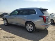 ✅ 2023 Cadillac XT6 FWD Luxury • VIN: 1GYKPAR47PZ113833 • Lot: 49066235. Wystawiony na Copart z przebiegiem 25 794 mil. Bezpłatny archiwum sprzedaży aukcyjnych z USA i szczegółowy raport historii pojazdu na DreamBid. Zdjęcie 2.