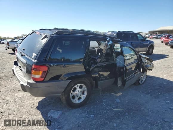 ✅ 2001 Jeep Grand Cherokee Laredo • VIN: 1J4GW48S81C677530 • Лот: 87052095. Опубликован ранее на Copart с пробегом Не указан. Бесплатный доступ к архиву аукционных продаж из США и подробный отчёт об истории автомобиля на DreamBid. Изображение 3.